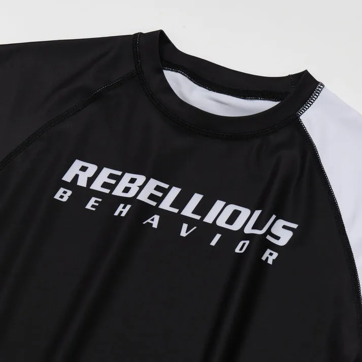 REBELLIOUS BEHAVIOR RBLS SPCS LOGO HALF RASH GUARD (BLACK)